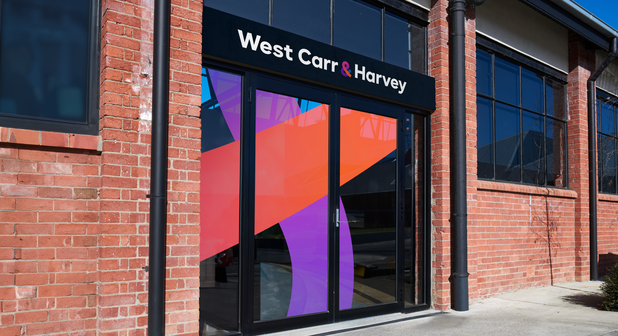 West Carr & Harvey Brand Identity Signage and Visual Language Decal on glass entrance